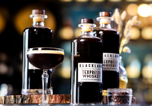 The image features bottles of Blackland Texas Pecan Brown Sugar Espresso Whiskey and a cocktail, set against a blurred background.